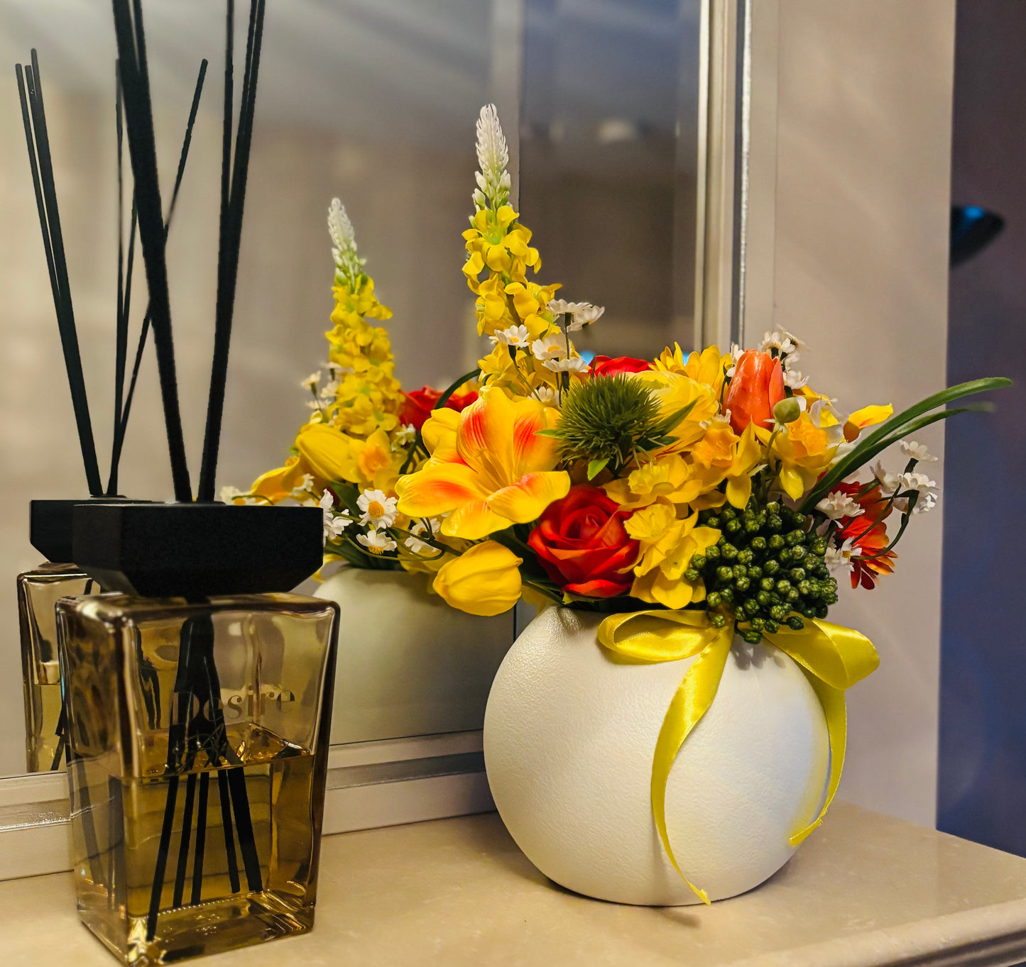 Yellow bouquet in round vase