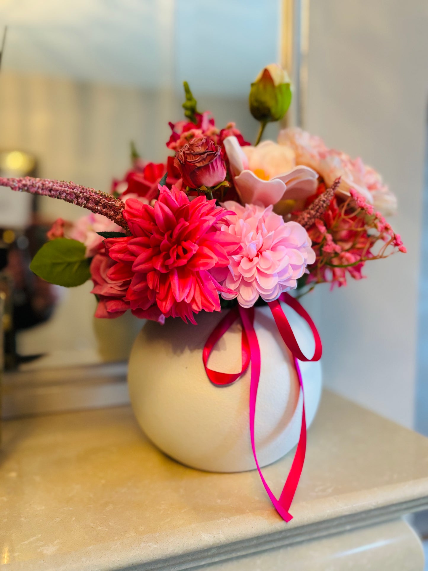 Pink bouquet in round vase